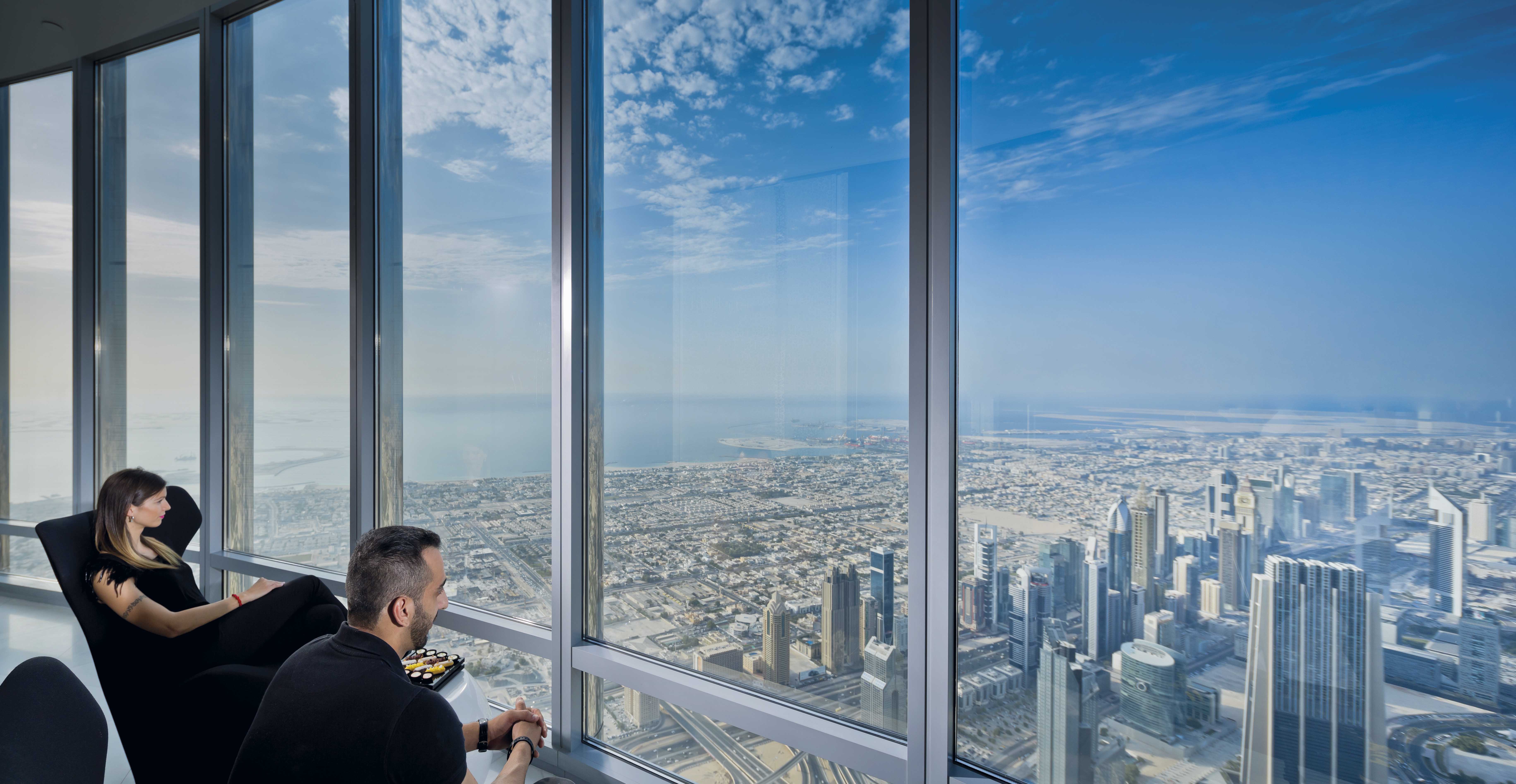 View ly. Дубай Бурдж Халифа смотровая площадка. Бурдж Халифа смотровая площадка на 148 этаже. "At the Top" Бурдж Халифа (смотровая площадка. Обзорная площадка в Бурдж Халифа 148 этаж.